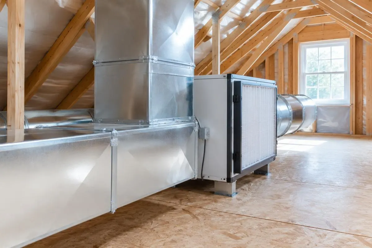 New sheet metal ductwork and filtration cabinet in a residential attic